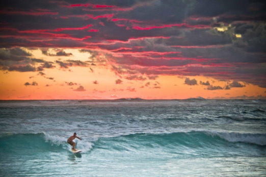 Local surfer enjoying an amazing winter sunset!